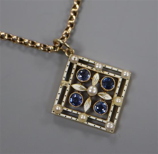 An early 20th century yellow metal, sapphire, enamel and seed pearl pendant, on a yellow metal chain, 25mm.